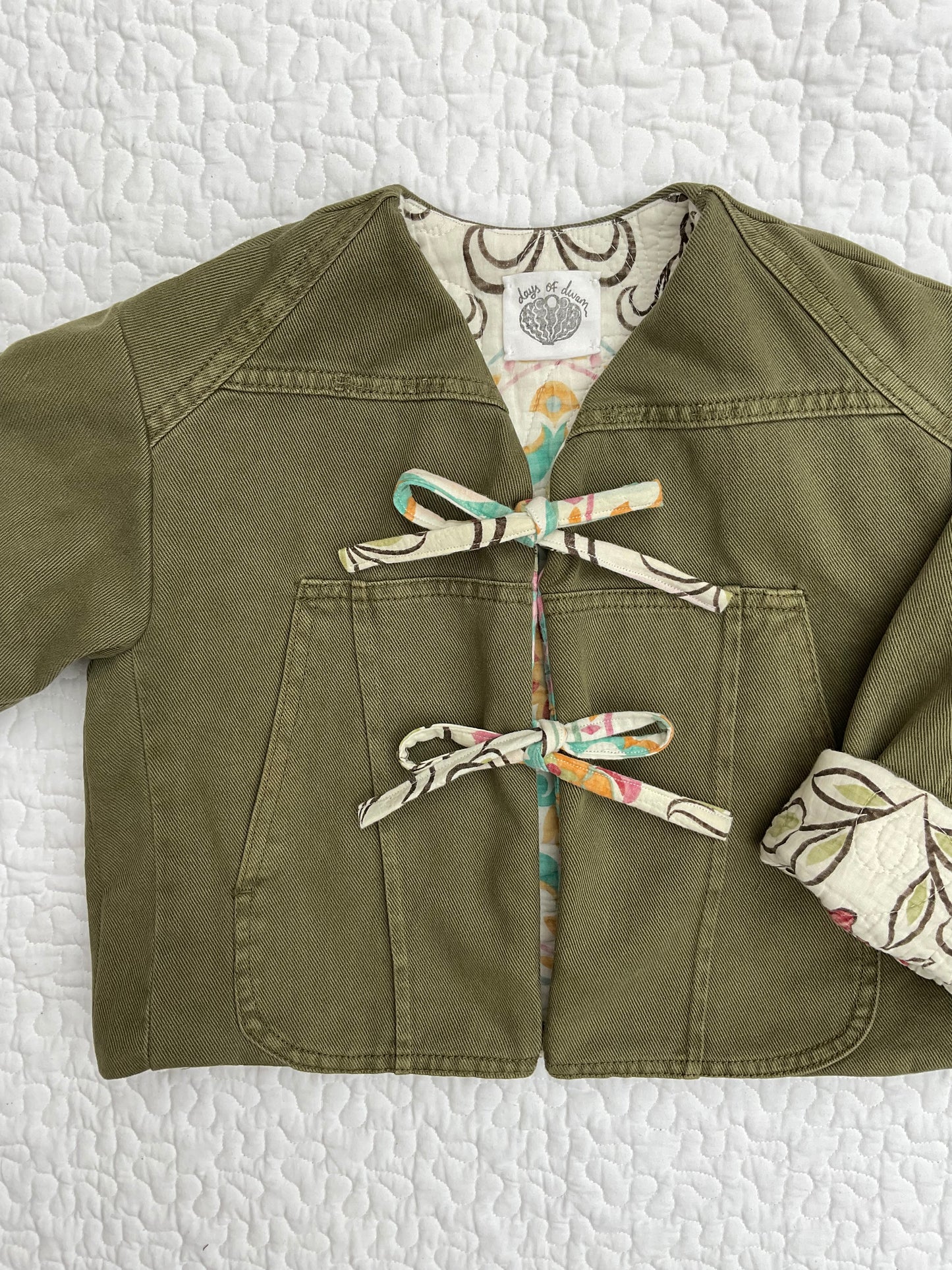 ‘Edie’ reversible quilted jacket with ties